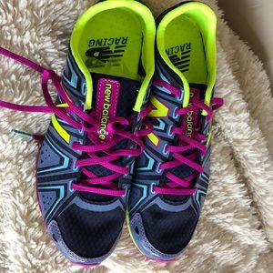 Never worn!  Size 8 NB WXC700 Spike Running Shoe